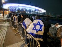 Supporters with Israeli flags queue outside the Stade de France stadium ahead of the UEFA Nations League League A, Group A2 football match b...