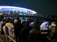 Supporters with Israeli flags queue outside the Stade de France stadium ahead of the UEFA Nations League League A, Group A2 football match b...