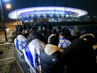 Supporters with Israeli flags queue outside the Stade de France stadium ahead of the UEFA Nations League League A, Group A2 football match b...