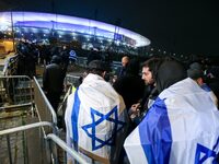 Supporters with Israeli flags queue outside the Stade de France stadium ahead of the UEFA Nations League League A, Group A2 football match b...