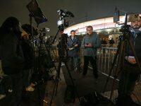 French and foreign media conduct a live broadcast in front of the Stade de France stadium ahead of the UEFA Nations League League A, Group A...