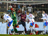 Italy goalkeeper Gianluigi Donnarumma, Belgium forward Romelu Lukaku, and Italy defender Alessandro Buongiorno participate in the match betw...