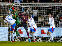 Italy goalkeeper Gianluigi Donnarumma, Belgium forward Romelu Lukaku, and Italy defender Alessandro Buongiorno participate in the match betw...