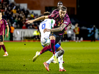 Italy forward Mateo Retegui and Belgium defender Zeno Debast play during the match between Belgium and Italy at the King Baudouin Stadium fo...