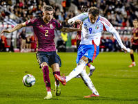 Italy forward Mateo Retegui and Belgium defender Zeno Debast play during the match between Belgium and Italy at the King Baudouin Stadium fo...