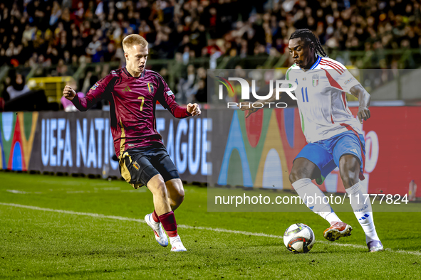 Belgium midfielder Arthur Vermeeren and Italy forward Moise Kean play during the match between Belgium and Italy at the King Baudouin Stadiu...