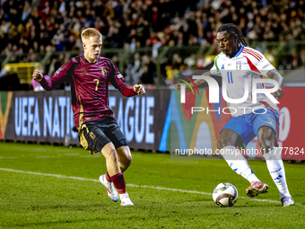 Belgium midfielder Arthur Vermeeren and Italy forward Moise Kean play during the match between Belgium and Italy at the King Baudouin Stadiu...