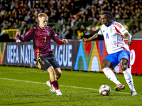 Belgium midfielder Arthur Vermeeren and Italy forward Moise Kean play during the match between Belgium and Italy at the King Baudouin Stadiu...