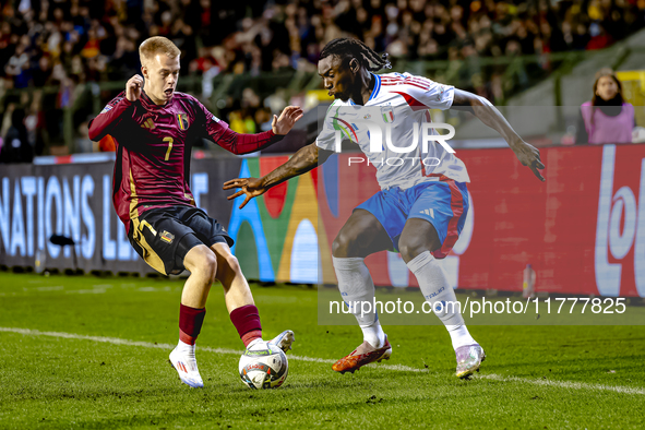 Belgium midfielder Arthur Vermeeren and Italy forward Moise Kean play during the match between Belgium and Italy at the King Baudouin Stadiu...