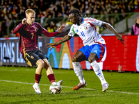 Belgium midfielder Arthur Vermeeren and Italy forward Moise Kean play during the match between Belgium and Italy at the King Baudouin Stadiu...