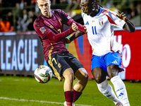 Belgium midfielder Arthur Vermeeren and Italy forward Moise Kean play during the match between Belgium and Italy at the King Baudouin Stadiu...