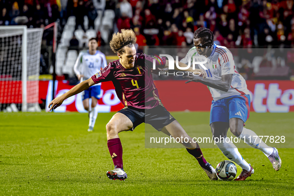 Belgium defender Wout Faes and Italy forward Moise Kean play during the match between Belgium and Italy at the King Baudouin Stadium for the...