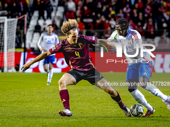 Belgium defender Wout Faes and Italy forward Moise Kean play during the match between Belgium and Italy at the King Baudouin Stadium for the...