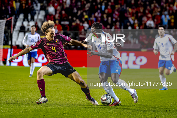 Belgium defender Wout Faes and Italy forward Moise Kean play during the match between Belgium and Italy at the King Baudouin Stadium for the...