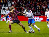 Belgium defender Wout Faes and Italy forward Moise Kean play during the match between Belgium and Italy at the King Baudouin Stadium for the...