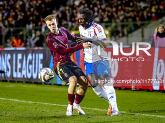 Belgium midfielder Arthur Vermeeren and Italy forward Moise Kean play during the match between Belgium and Italy at the King Baudouin Stadiu...