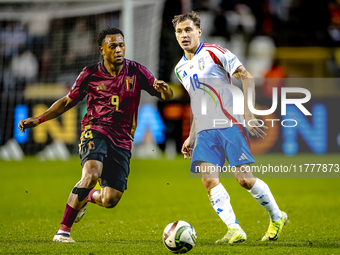 Belgium forward Lois Openda and Italy midfielder Nicolo Barella play during the match between Belgium and Italy at the King Baudouin Stadium...