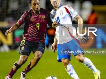 Belgium forward Lois Openda and Italy midfielder Nicolo Barella play during the match between Belgium and Italy at the King Baudouin Stadium...