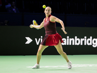 Ana Bogdan of Romania plays a forehand during the Billie Jean King Cup match between Japan and Romania at Palacio de los Deportes Martin Car...