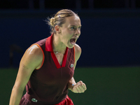 Ana Bogdan of Romania celebrates a point during the Billie Jean King Cup match between Japan and Romania at Palacio de los Deportes Martin C...