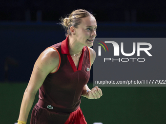 Ana Bogdan of Romania celebrates a point during the Billie Jean King Cup match between Japan and Romania at Palacio de los Deportes Martin C...