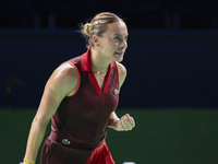 Ana Bogdan of Romania celebrates a point during the Billie Jean King Cup match between Japan and Romania at Palacio de los Deportes Martin C...