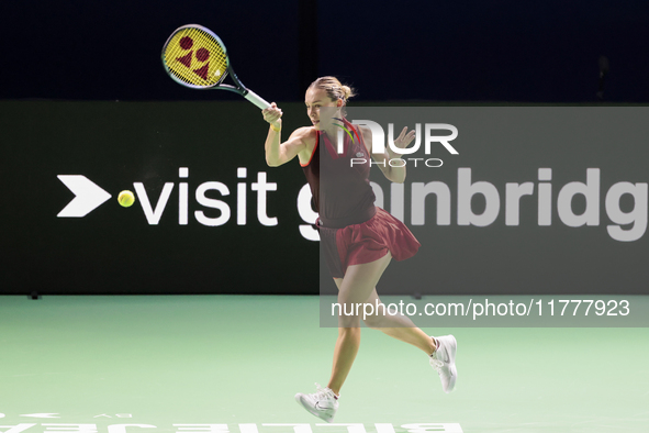 Ana Bogdan of Romania plays a forehand during the Billie Jean King Cup match between Japan and Romania at Palacio de los Deportes Martin Car...