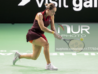 Ana Bogdan of Romania plays backwards during the Billie Jean King Cup match between Japan and Romania at Palacio de los Deportes Martin Carp...