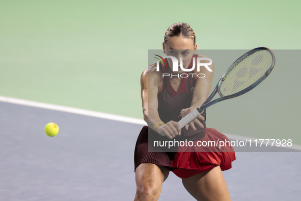 Ana Bogdan of Romania plays backwards during the Billie Jean King Cup match between Japan and Romania at Palacio de los Deportes Martin Carp...