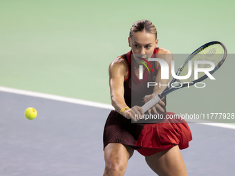 Ana Bogdan of Romania plays backwards during the Billie Jean King Cup match between Japan and Romania at Palacio de los Deportes Martin Carp...