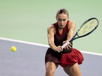 Ana Bogdan of Romania plays backwards during the Billie Jean King Cup match between Japan and Romania at Palacio de los Deportes Martin Carp...