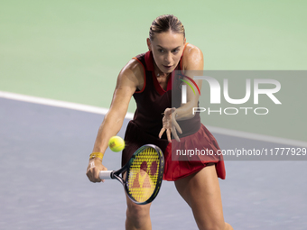 Ana Bogdan of Romania plays backwards during the Billie Jean King Cup match between Japan and Romania at Palacio de los Deportes Martin Carp...