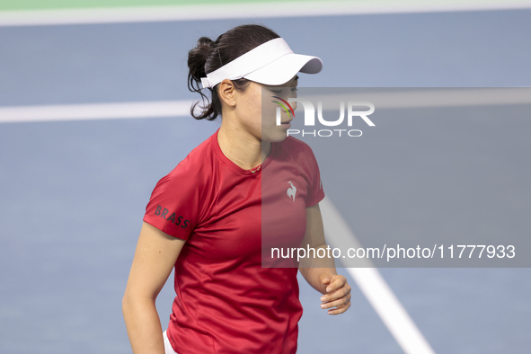 Nao Hibino of Japan plays during the Billie Jean King Cup match between Japan and Romania at Palacio de los Deportes Martin Carpena in Malag...