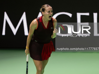 Ana Bogdan of Romania celebrates a point during the Billie Jean King Cup match between Japan and Romania at Palacio de los Deportes Martin C...