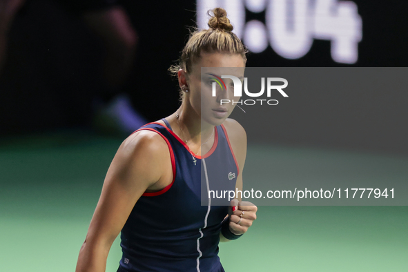 Jaquesline Cristian of Romania celebrates a point during the Billie Jean King Cup match between Japan and Romania at Palacio de los Deportes...