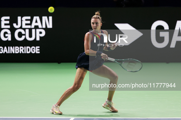 Jaquesline Cristian of Romania plays a forehand during the Billie Jean King Cup match between Japan and Romania at Palacio de los Deportes M...