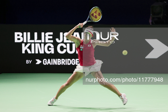 In Malaga, Spain, on November 14, 2024, Ena Shibahara of Japan plays a forehand during the Billie Jean King Cup match between Japan and Roma...