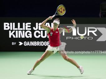 In Malaga, Spain, on November 14, 2024, Ena Shibahara of Japan plays a forehand during the Billie Jean King Cup match between Japan and Roma...