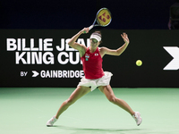 In Malaga, Spain, on November 14, 2024, Ena Shibahara of Japan plays a forehand during the Billie Jean King Cup match between Japan and Roma...