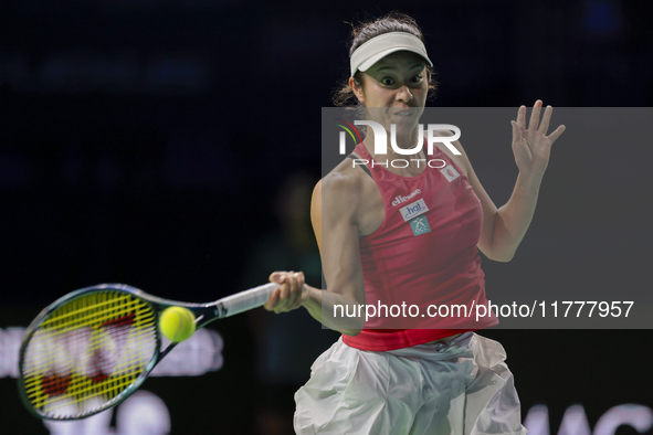 In Malaga, Spain, on November 14, 2024, Ena Shibahara of Japan plays a forehand during the Billie Jean King Cup match between Japan and Roma...