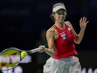 In Malaga, Spain, on November 14, 2024, Ena Shibahara of Japan plays a forehand during the Billie Jean King Cup match between Japan and Roma...