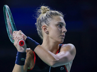 In Malaga, Spain, on November 14, 2024, Jaquesline Cristian of Romania plays a backhand during the Billie Jean King Cup match between Japan...