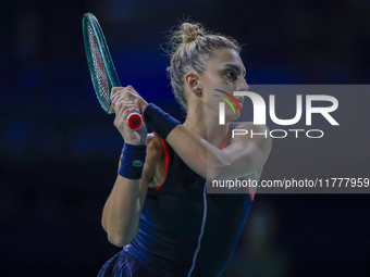 In Malaga, Spain, on November 14, 2024, Jaquesline Cristian of Romania plays a backhand during the Billie Jean King Cup match between Japan...