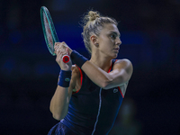 In Malaga, Spain, on November 14, 2024, Jaquesline Cristian of Romania plays a backhand during the Billie Jean King Cup match between Japan...