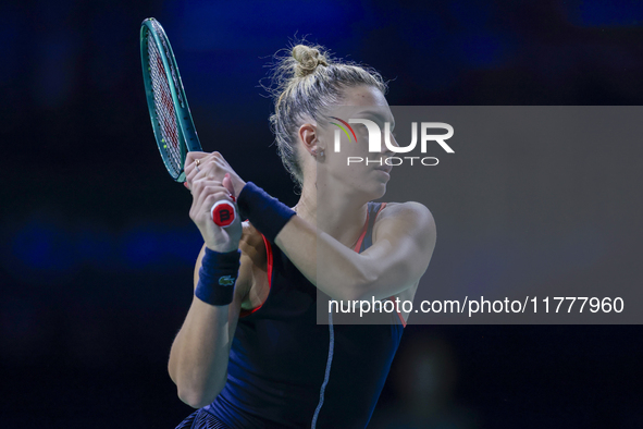 In Malaga, Spain, on November 14, 2024, Jaquesline Cristian of Romania plays a backhand during the Billie Jean King Cup match between Japan...