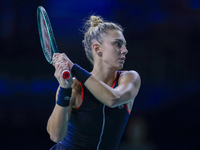 In Malaga, Spain, on November 14, 2024, Jaquesline Cristian of Romania plays a backhand during the Billie Jean King Cup match between Japan...