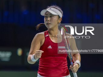 Eri Hozumi of Japan celebrates a point during the Billie Jean King Cup match between Japan and Romania at Palacio de los Deportes Martin Car...