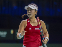 Eri Hozumi of Japan celebrates a point during the Billie Jean King Cup match between Japan and Romania at Palacio de los Deportes Martin Car...