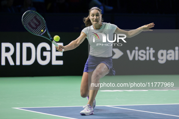 Monica Niculescu of Romania plays a forehand during the Billie Jean King Cup match between Japan and Romania at Palacio de los Deportes Mart...