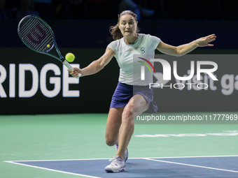 Monica Niculescu of Romania plays a forehand during the Billie Jean King Cup match between Japan and Romania at Palacio de los Deportes Mart...